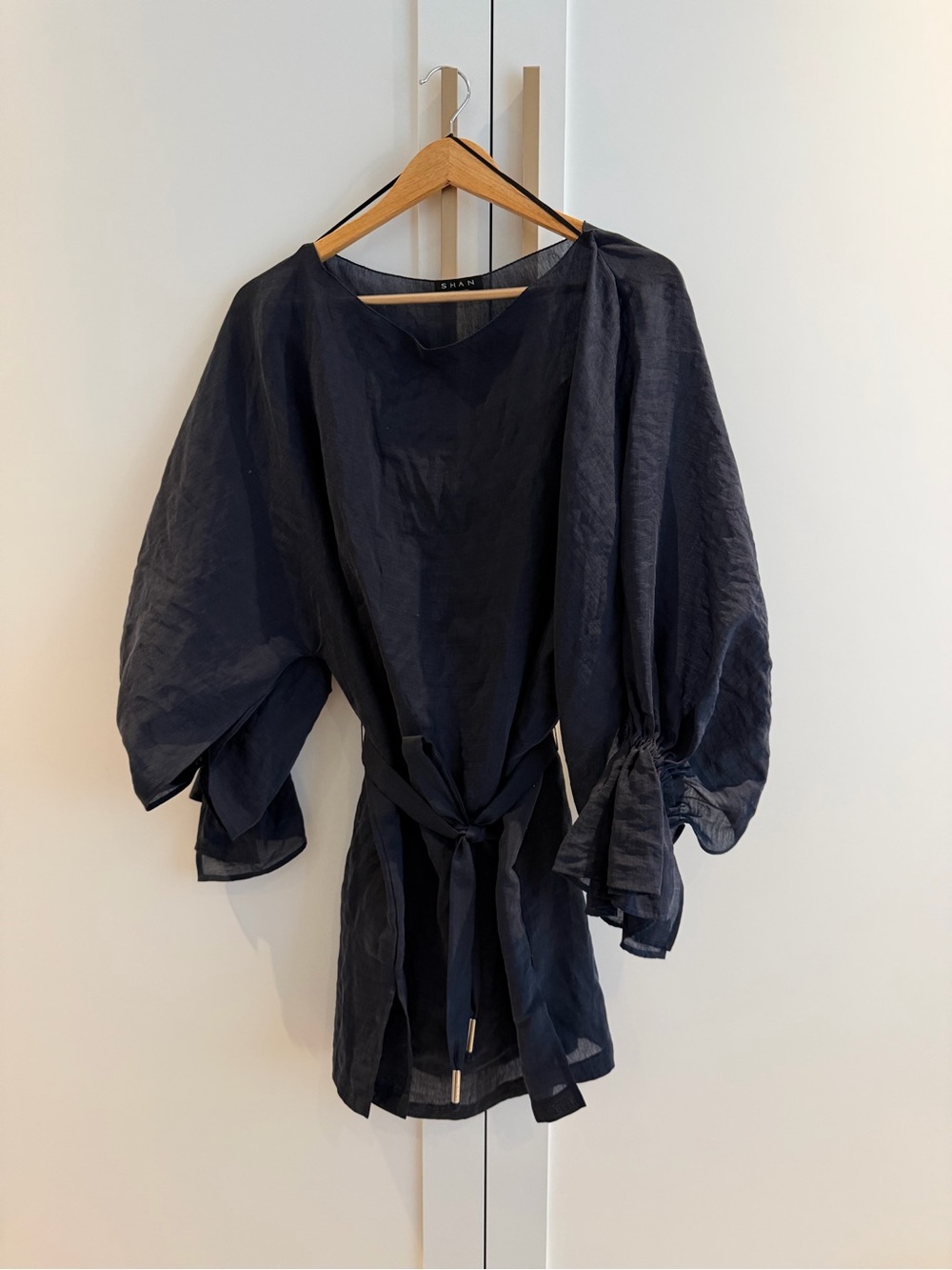 SHAN Navy semi sheer Puff Sleeve Mini dress with Self Tie Belt and slip lining.